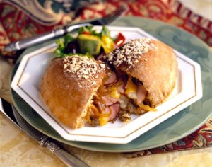 Ham and Cheese Calzone w/ Caramelized Yellow Peppers and Onions