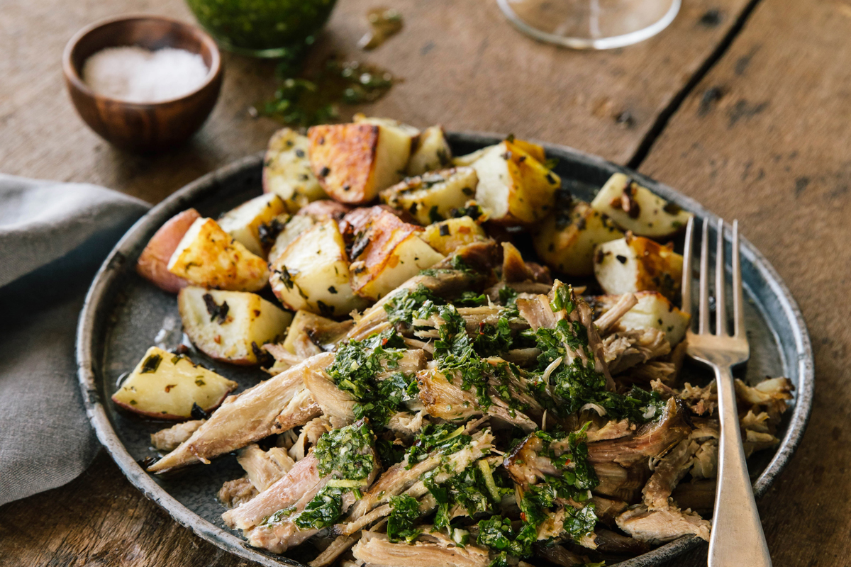 Pork Shoulder Butt with Chimichurri Sauce and Herb-Roasted Potatoes